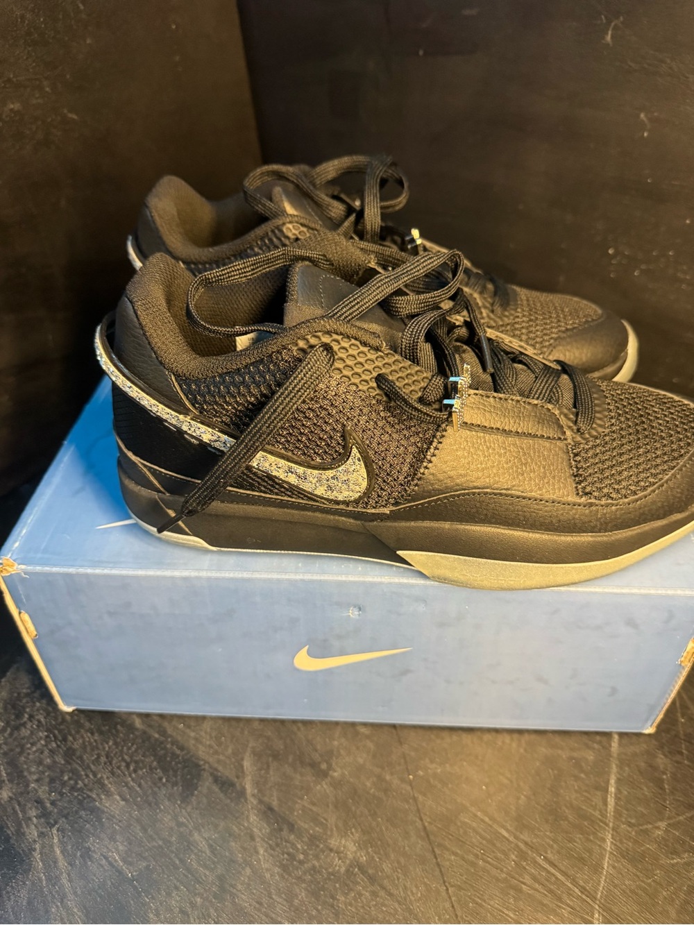 Nike Black Men's Sneakers with Speckled Silver Swoosh ja 1